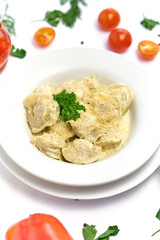 Italian ravioli pasta with meat or fish on white background