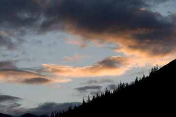 Fototapeta na wymiar Sunset Lights Clouds above Endicott Arm, Alaska