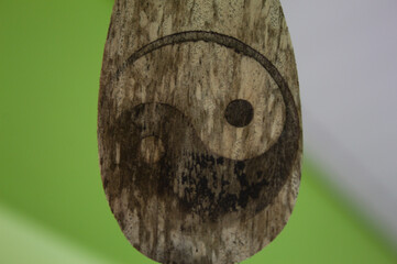Wooden Yin and Yang symbol hanging