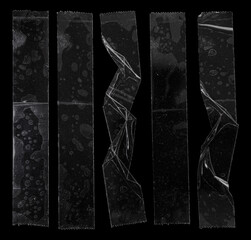 set of transparent adhesive tape or strips isolated on black background with scratches and fingerprints, crumpled plastic sticky snips, poster design overlays or elements.
