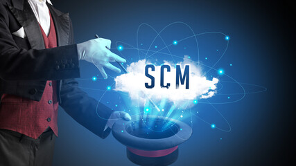 Magician is showing magic trick with SCM abbreviation, modern tech concept
