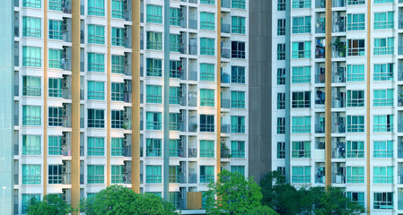 Modern residential building with windows and balcony for background or banner