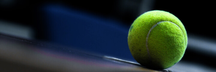 Tennis balls placed on the table.