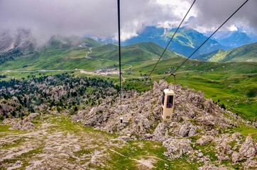 Telecabine Gondelbahn Sassolungo to Forcella del Sassolungo in the Dolomite Alps, South Tyrol, Italy