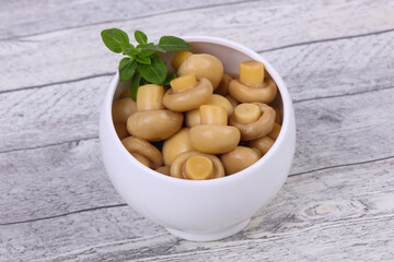 Pickled champignon heap in the bowl