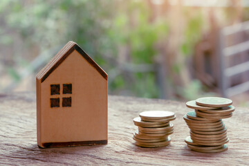 Property investment, House and stack of coins