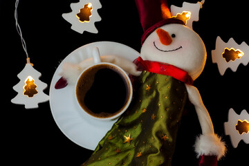 New year and Christmas concept. Funny snowman and white cup of coffee. Christmas composition with...