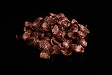 Chocolate Cereals Isolated On Black Background