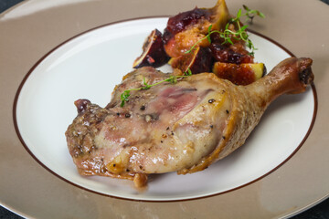 Roasted. duck. leg with plum and apple