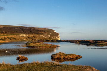 Obraz premium Cuckmere Haven and Haven Brow with Evening Light