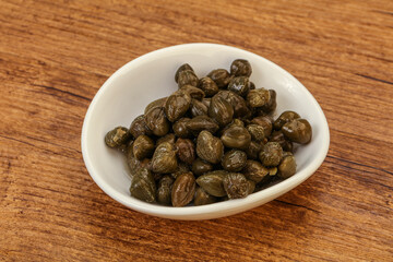 Tasty capers in the bowl