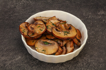 Roasted champignon with herbs and spices