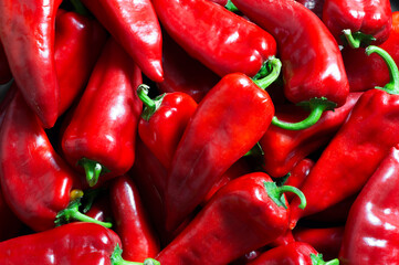 Fresh ripe red capia pepper or hot chili pepper texture background, turkish vegetable spice concept