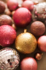 Glitter shiny Christmas decorations closeup. Winter holiday season. Selective focus.