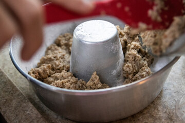 Vegan cake. Form with coconut flour, crushed almonds, chia gel and brown sugar