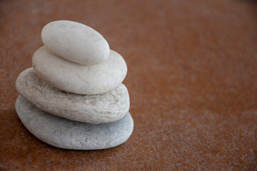 Fototapeta na wymiar stack of stones on the beach