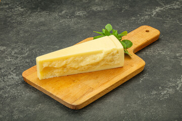 Hard parmesan cheese served basil