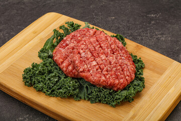Raw beef burger cutlet for cooking