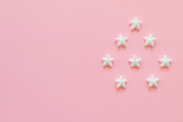 pink stars on white background