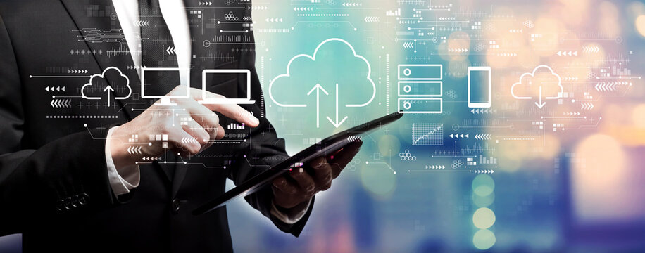 Cloud computing with businessman using his tablet computer