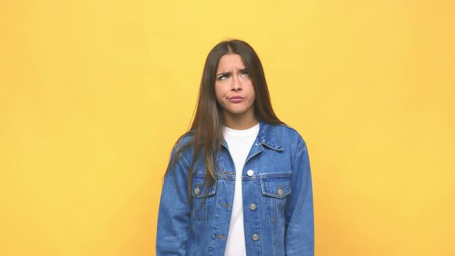 Young cute woman confused, feels doubtful and unsure