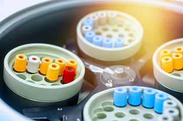 laboratory centrifuge with test tubes with biomaterial
