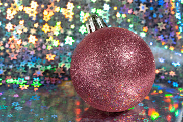 Christmas ball on a beautiful shiny background