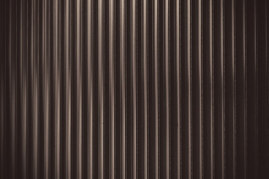 Close up Texture. Sheet Metal profile, dark brown color.