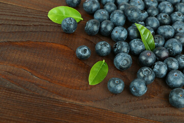 blueberries berries on wooden background top view