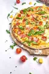 Italian pizza with pepperoni, mozzarella and tomato sauce wooden table