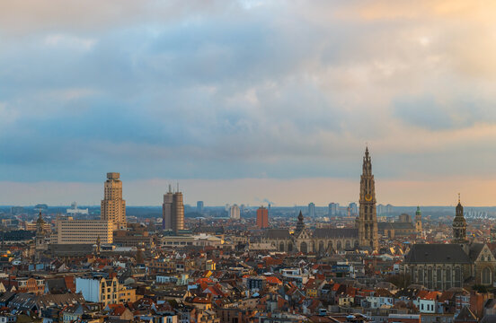 Cityscape of Antwerpen (Antwerp) at sunset with the cathedral tower, Belgium.