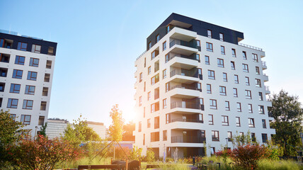 Architectural details of modern apartment building. Modern european residential apartment building complex. Sunset.