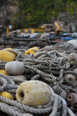 fisherman's ropes piled up in the small port of Camogli in Liguria