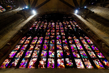 Obraz premium Milan, Italy September 19, 2019. Stained glass in interior Milan Cathedral Duomo di Milano (Cattedrale di Santa Maria Nascente) Metropolitan Cathedral-Basilica of the Nativity of Saint Mary