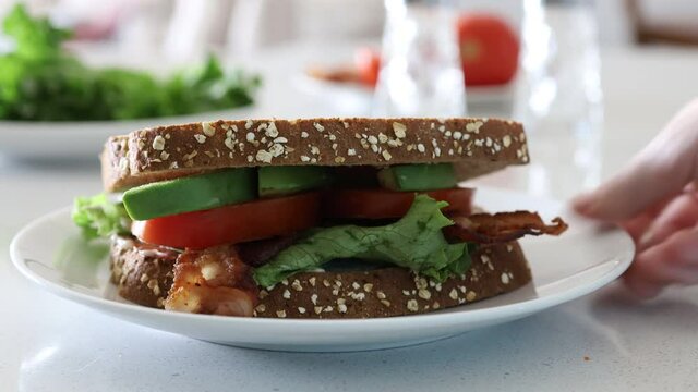 Serving a BLT Sanwich
