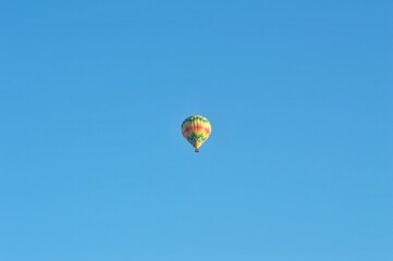 A single hot air balloon over Napa Valley