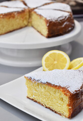 Fluffy lemon cake with a caramel and glass sugar covered, perfect dessert for a sunny day with a ice tea.

