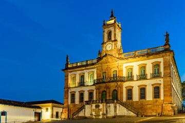 Fototapeta na wymiar Historic building in Baroque style at dusk in the central square of the city of Ouro Preto in Minas Gerais, Brazil