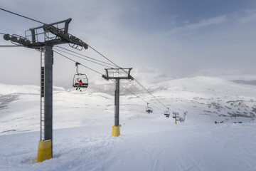 Fototapeta na wymiar Ski lift in the mountains