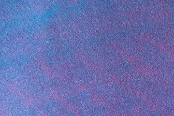 colored decorative coating with fine stone abrasive, rough background