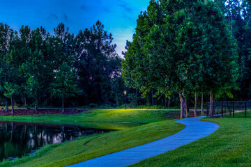 Early morning walk around the lake  on a peaceful path