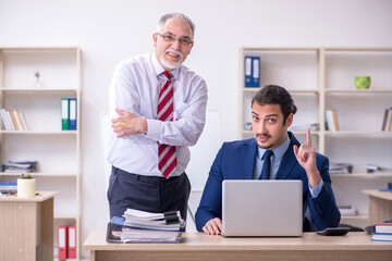 Two employees in the office