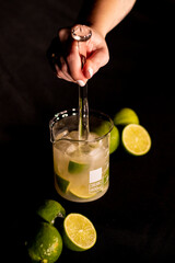 Brazilian Caipirinha. Lemon, ice, sugar and cachaça. Fruit cocktail with alcohol. 