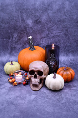 Halloween Decorations with Skull, Pumpkins candles and Crystal Ball