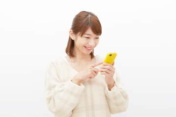女性　スマートフォン