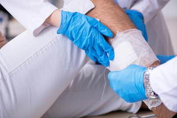Young leg injured man in the hospital
