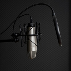 Closeup microphone on a stand in front of black soundproof wall in professional recording studio.