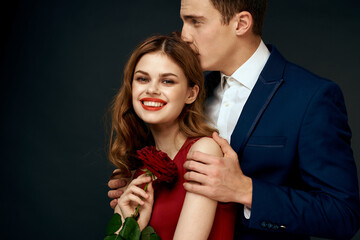 Beautiful couple charm hug lifestyle relationship rose luxury dark background