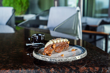 cup of coffee and caramel cake