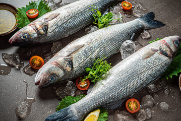 Delicious fresh fish on dark  background